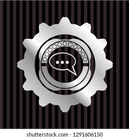 speech bubble icon inside silvery shiny badge