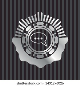 speech bubble icon inside silvery badge