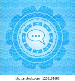 speech bubble icon inside water wave emblem.