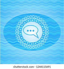 speech bubble icon inside water concept style emblem.