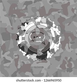 speech bubble icon on grey camouflaged pattern