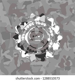 speech bubble icon on grey camouflaged texture