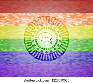 speech bubble icon on mosaic background with the colors of the LGBT flag