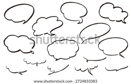 Speech bubbles drawn with chalk or crayons
