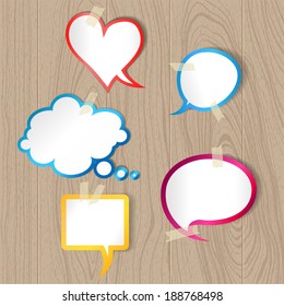 Speech bubbles on wood texture