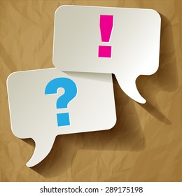 speech bubbles question mark blue exclamation pink on a crumpled paper brown background