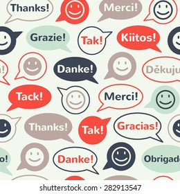 Speech bubbles with smiles and "thank you" in different languages: english, french, german, italian, spanish, norwegian, danish, finnish, brazilian, czech. Seamless vector pattern. Flat design.