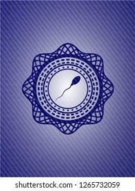sperm icon inside badge with jean texture