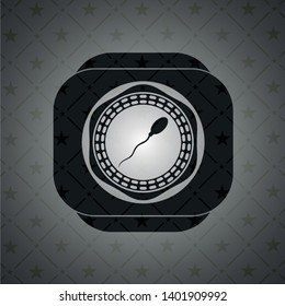 sperm icon inside black emblem