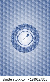 sperm icon inside blue badge with geometric pattern.