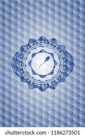 sperm icon inside blue emblem with geometric pattern.