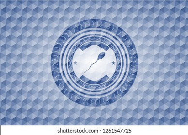 sperm icon inside blue polygonal badge.