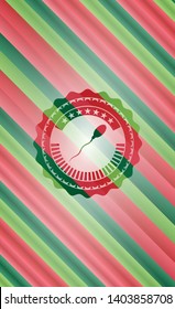 sperm icon inside christmas style emblem.