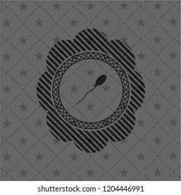 sperm icon inside dark emblem