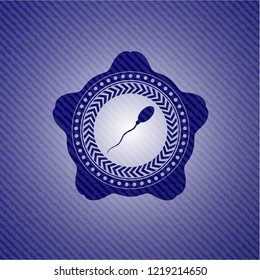 sperm icon inside denim background