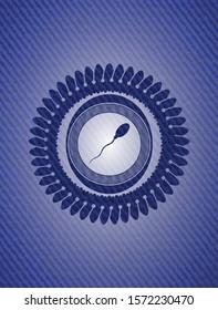 sperm icon inside denim background