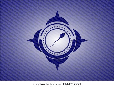 sperm icon inside emblem with denim high quality background