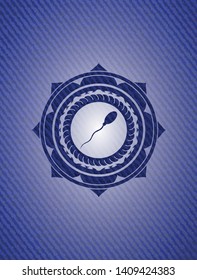 sperm icon inside emblem with jean texture