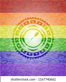sperm icon inside emblem on mosaic background with the colors of the LGBT flag
