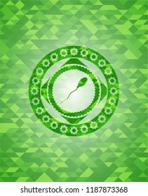 sperm icon inside green emblem with mosaic background
