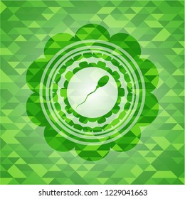 sperm icon inside green emblem. Mosaic background