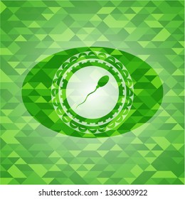sperm icon inside green emblem with mosaic background