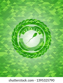 sperm icon inside green emblem. Mosaic background