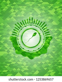 sperm icon inside green mosaic emblem