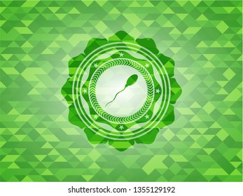 sperm icon inside green mosaic emblem