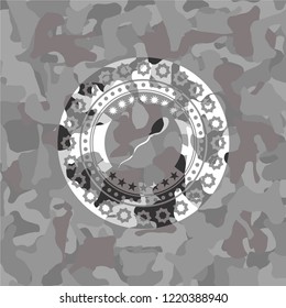sperm icon inside grey camouflage texture