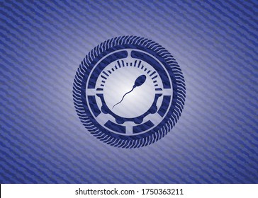 icono de esperma dentro del fondo de jean o denim. 