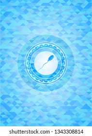 sperm icon inside light blue emblem. Mosaic background