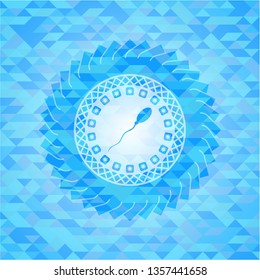 sperm icon inside light blue mosaic emblem