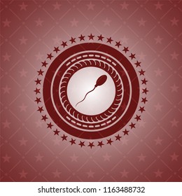 sperm icon inside red emblem
