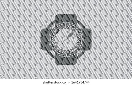 sperm icon inside shiny silver emblem. Scales pattern. Vector Illustration. Detailed.