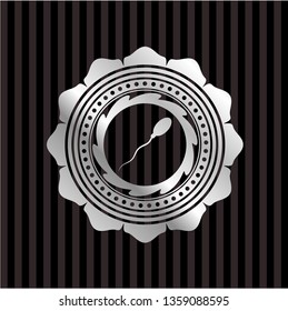 sperm icon inside silver badge or emblem