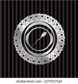 sperm icon inside silvery emblem or badge