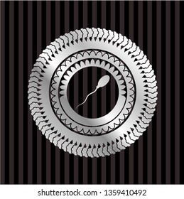 sperm icon inside silvery shiny emblem