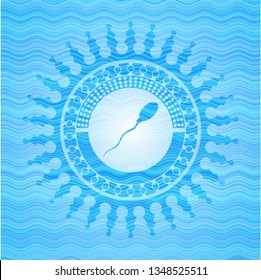 sperm icon inside water wave style emblem.