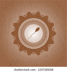 sperm icon inside wooden emblem. Retro