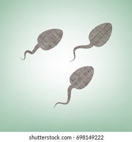 Sperms sign illustration. Vector. Brown flax icon on green background with light spot at the center.