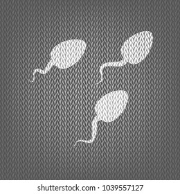 Sperms sign illustration. Vector. White knitted icon on gray knitted background. Isolated.