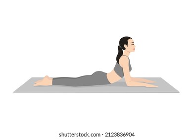 Sphinx Pose. Hermosa práctica femenina Salamba Bhujangasana, Niravalasana. Joven atractiva practicando yoga. ejercicios, ropa deportiva negra, pantalones grises y parte superior, interior de largo