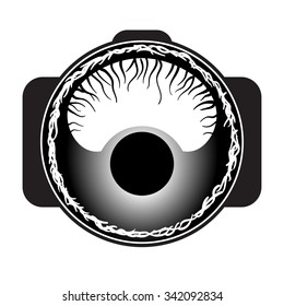 Spider eye on macro lens logo.