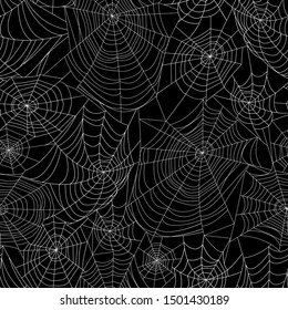 Spider webs on black. Seamless pattern. Halloween background