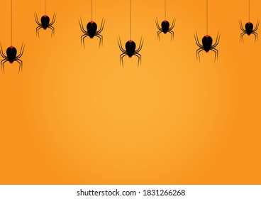 Spiders hanging for decoration on yellow background. Halloween Day.