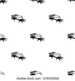 Spikes on the shoes.Mountaineering single icon in black style vector symbol stock illustration web.