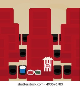 Spilled popcorn on a brow background, cinema, movies and entertainment concept, soda water in glass