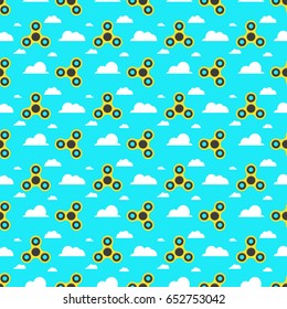 Spinner. A pattern of yellow spinners in a flat style. Spinners are spinning against the sky. Flat, white clouds. A modern antistress toy for recreation. Play with your fingers. Vector illustration