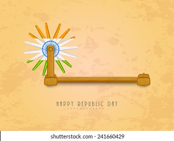 Spinning wheel in national tricolor with Ashoka Wheel on grungy background for Happy Indian Republic Day celebration.